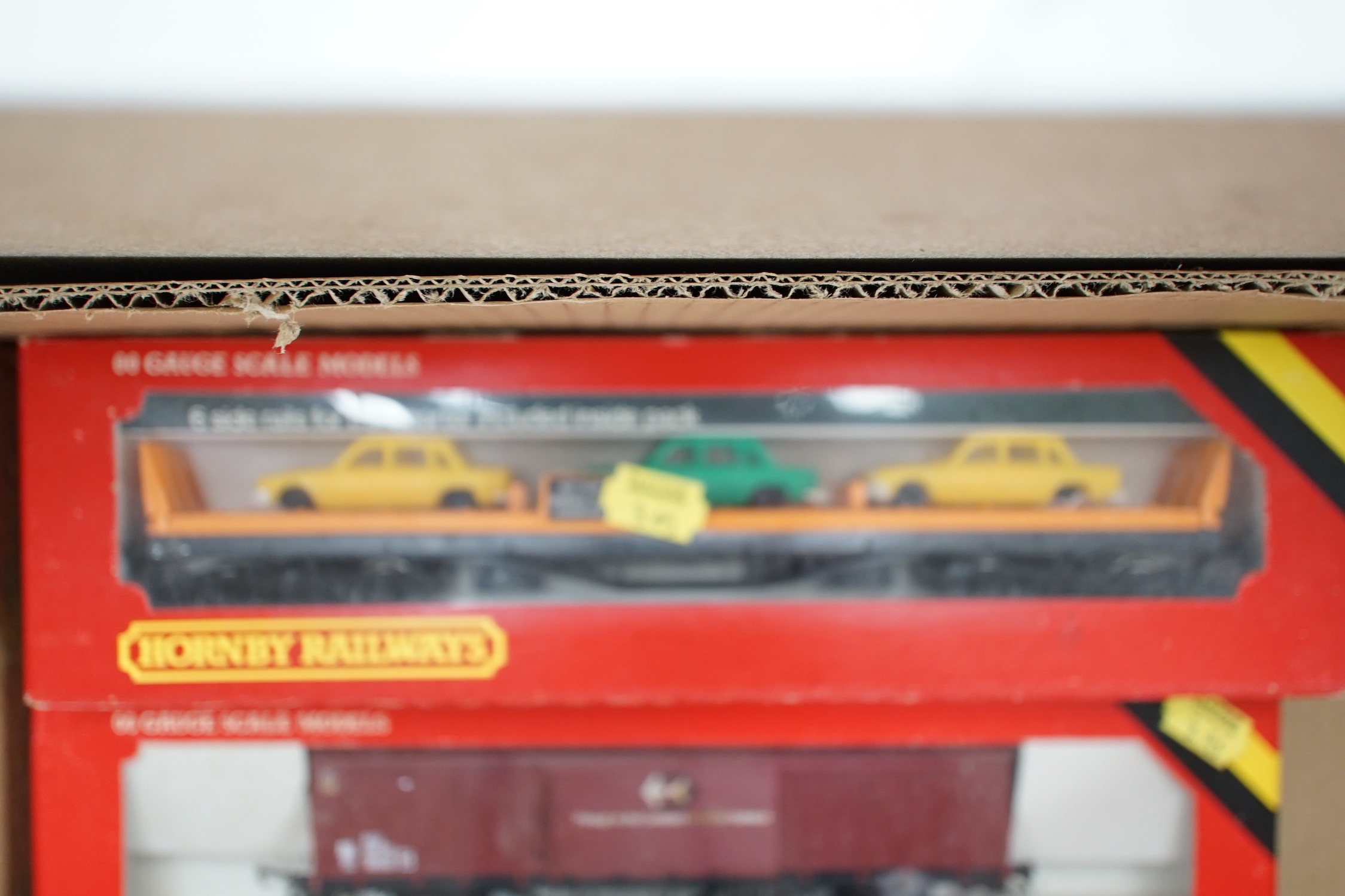 Thirty-six boxed Hornby railways 00 gauge items including five BR diesel locomotives; a Class 47 (R075), a Hymek (R074), a Class 25 (R068) and two Class 08 shunters (R156), together with fifteen freight wagons, twelve bo